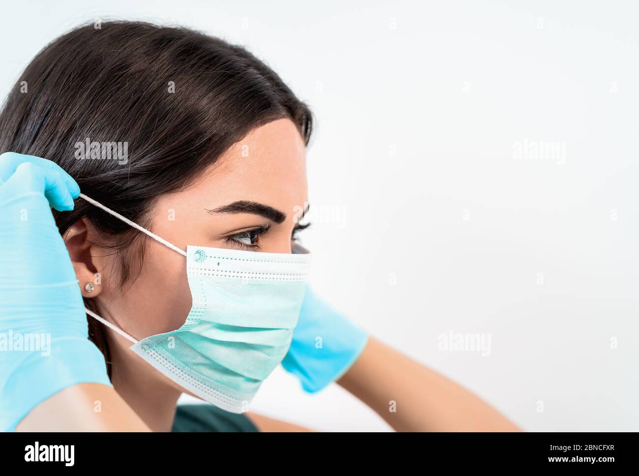 Nurse doctor wearing gloves hi-res stock photography and images - Alamy