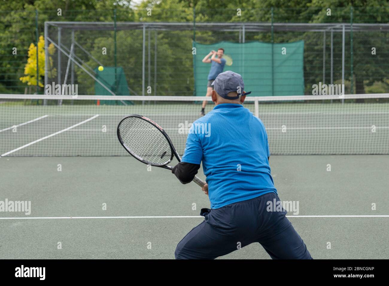 Brockwell Park, UK. 14th May 2020. People playing tennis in Brockwell Park  following Government advice that lockdown rules have been relaxed for a  small number of sports. Tennis, along with golf and
