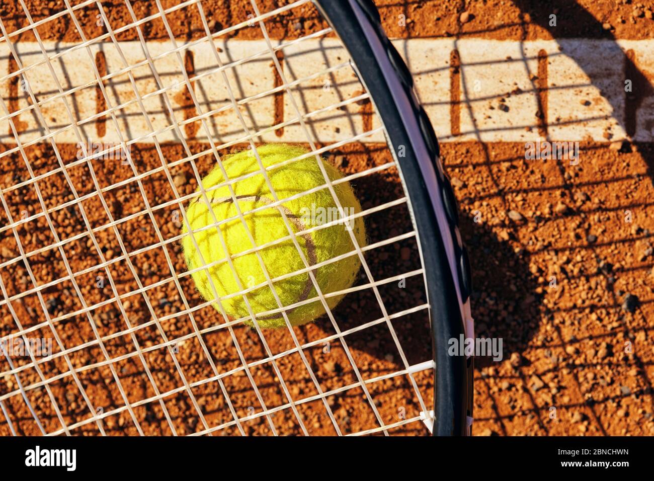 tennis ball on a tennis court Stock Photo