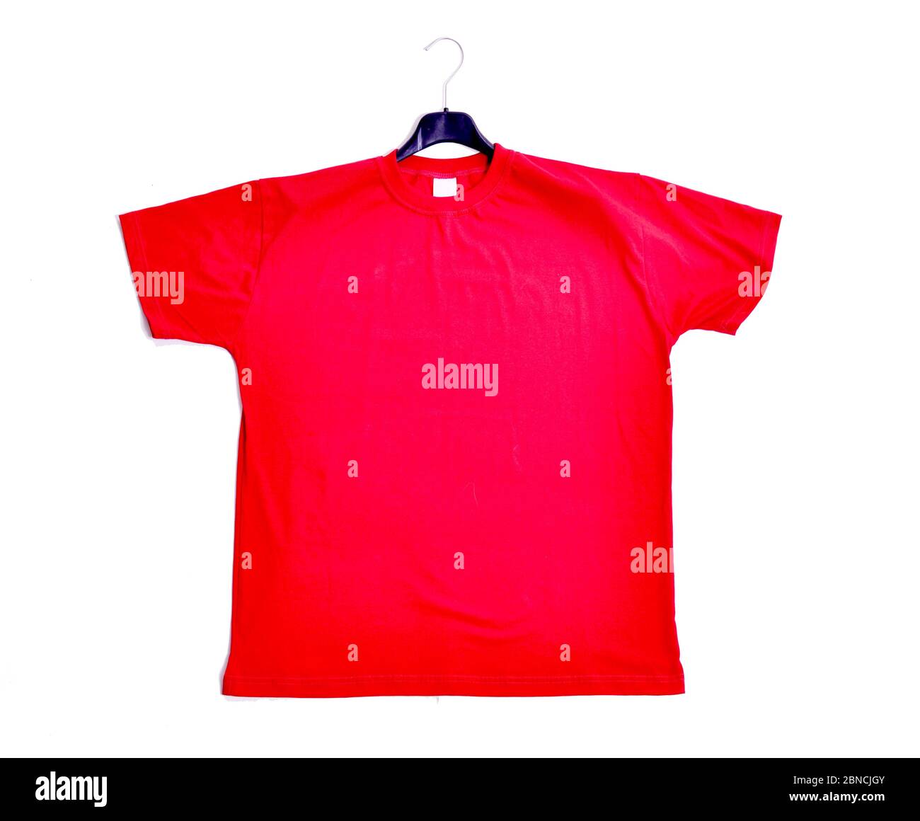 red blank t-shirt on white background Stock Photo - Alamy