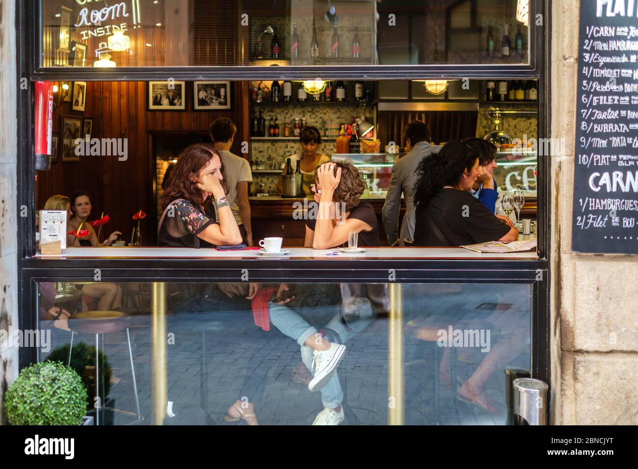 Cafe scene just off la Rambla, Barcelona, Spain. Stock Photo