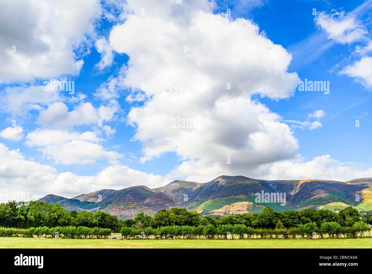 Cumulus clouds over Skiddaw in the Lake District Stock Photo