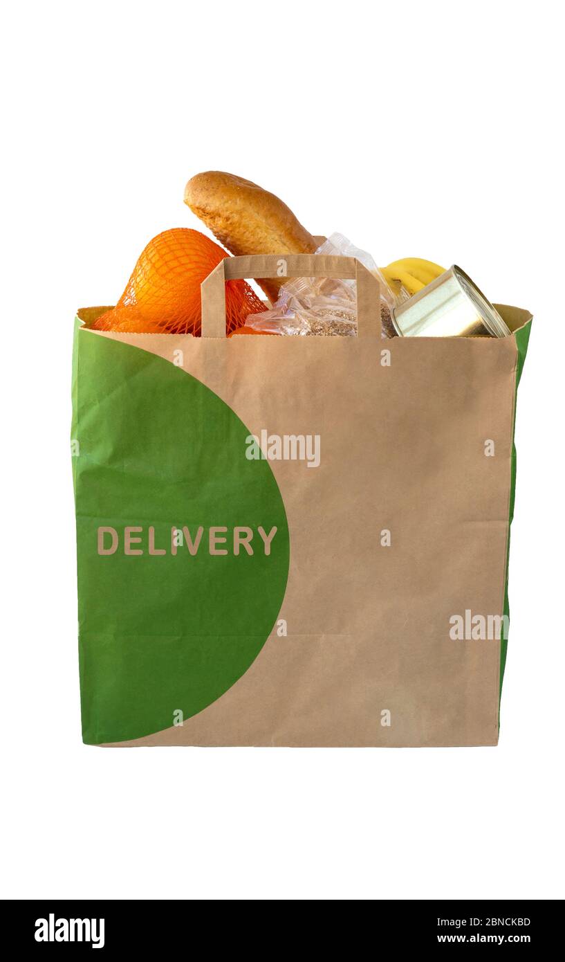 foodstuff in a paper bag on a white background. delivery food. Stock Photo