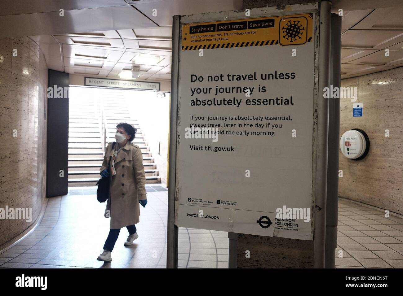 Commuter wearing face mask at piccadilly circus london underground