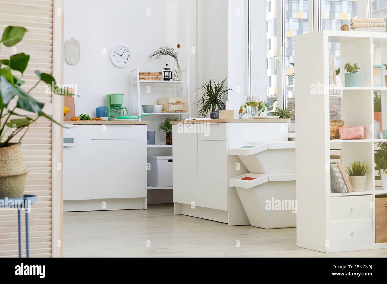 Image of cosy domestic kitchen with white furniture Stock Photo