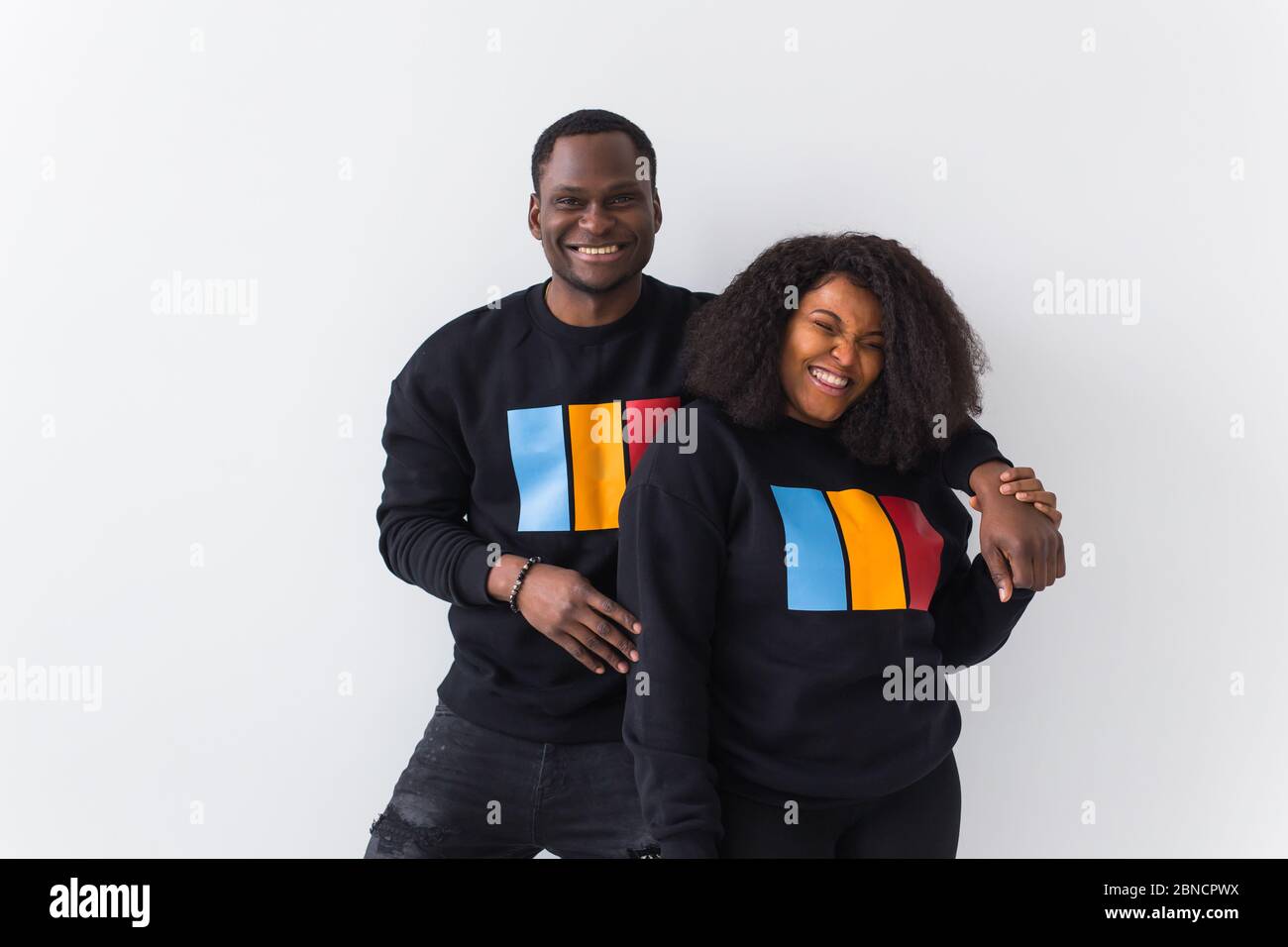 Happy African American woman and man have relationships, toothy smile ...