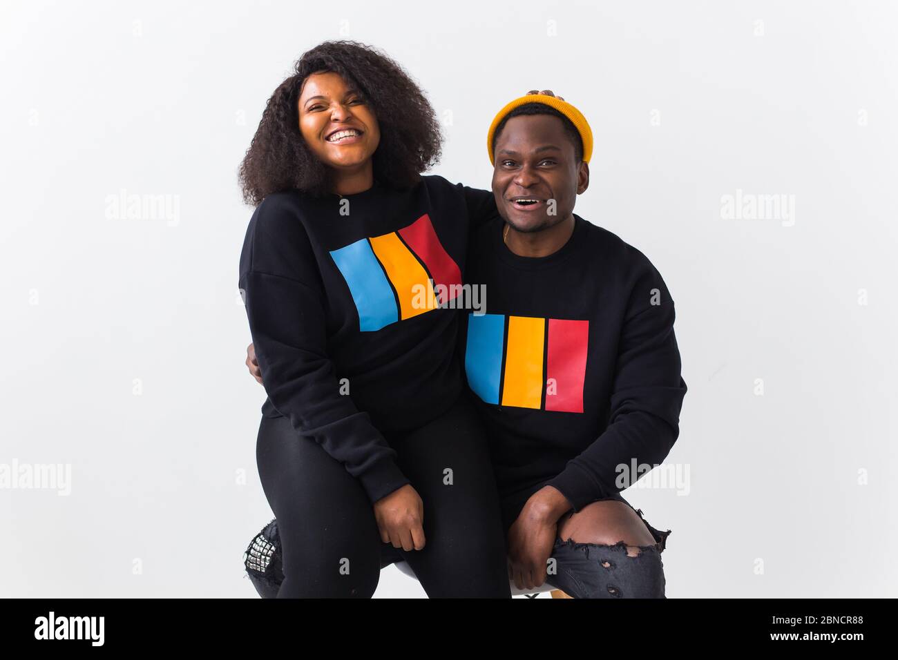 Happy African American woman and man have relationships, toothy smile ...