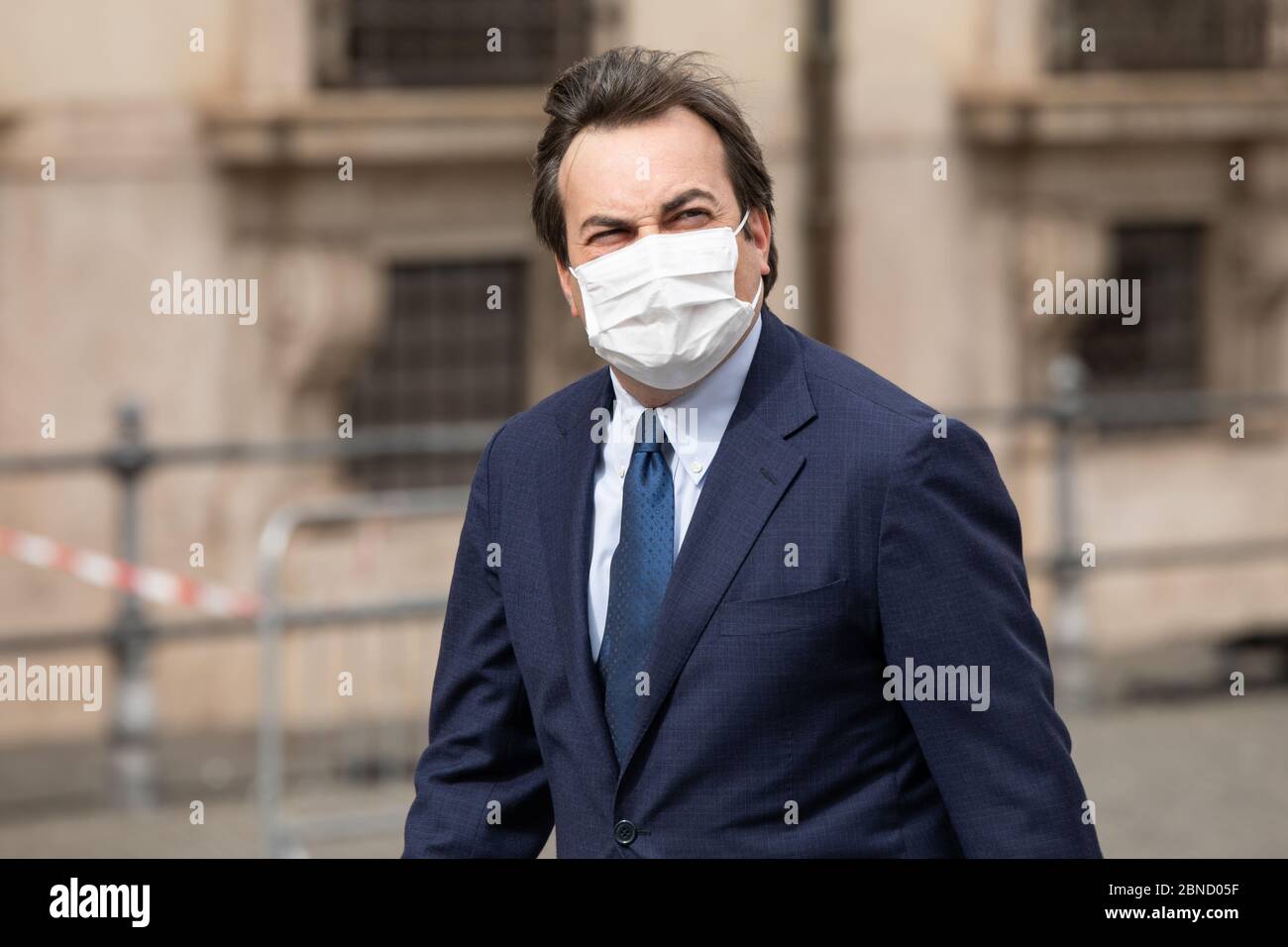 Rome, Italy. 13th May, 2020. Italian Minister for European Affairs, Vincenzo Amendola, enters Palazzo Chigi before the Council of Ministers while wearing a face mask as a precaution against the spread of corona virus. Credit: Cosimo Martemucci/SOPA Images/ZUMA Wire/Alamy Live News Stock Photo