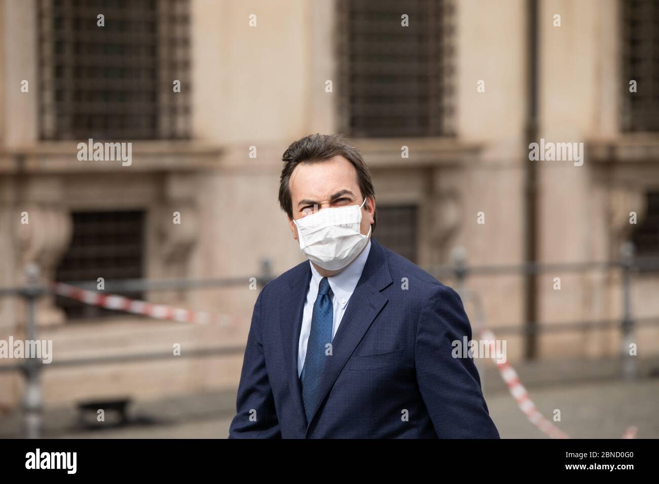 Rome, Italy. 13th May, 2020. Italian Minister for European Affairs, Vincenzo Amendola, enters Palazzo Chigi before the Council of Ministers while wearing a face mask as a precaution against the spread of corona virus. Credit: Cosimo Martemucci/SOPA Images/ZUMA Wire/Alamy Live News Stock Photo