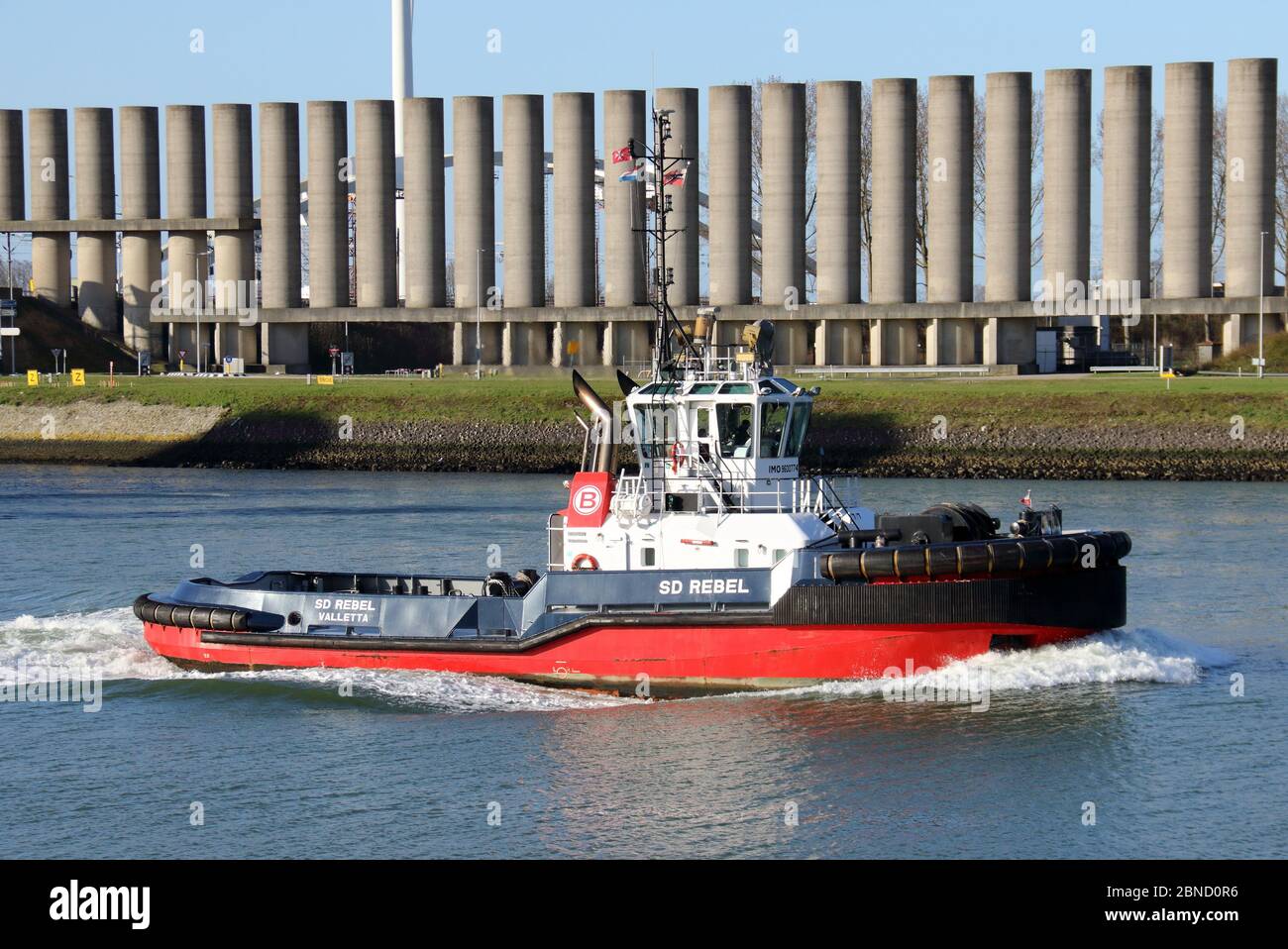The SD Rebel harbor tug works in the port of Rotterdam on March 12, 2020. Stock Photo