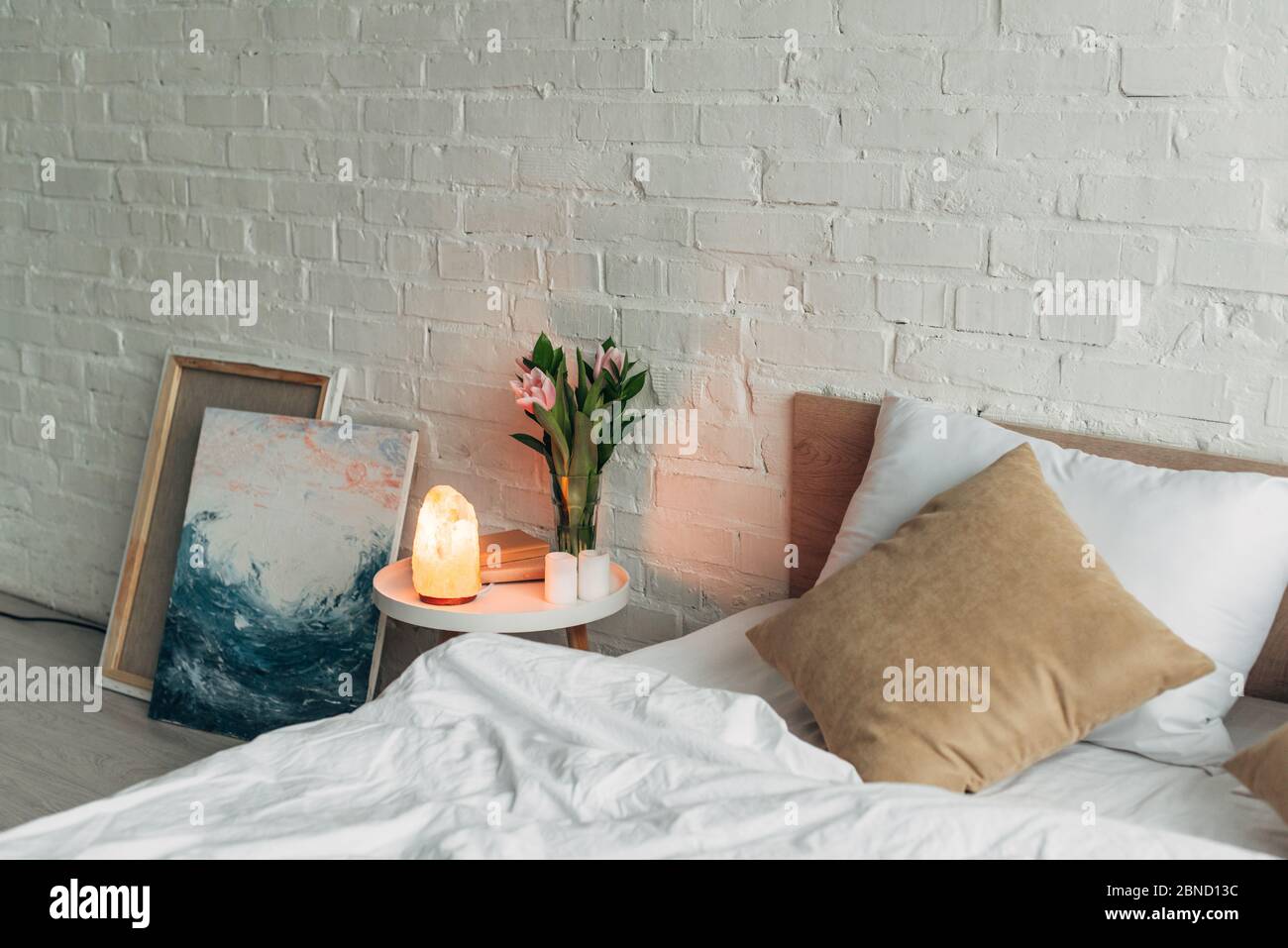 interior of bedroom with Himalayan salt lamp, flowers and candles Stock  Photo - Alamy