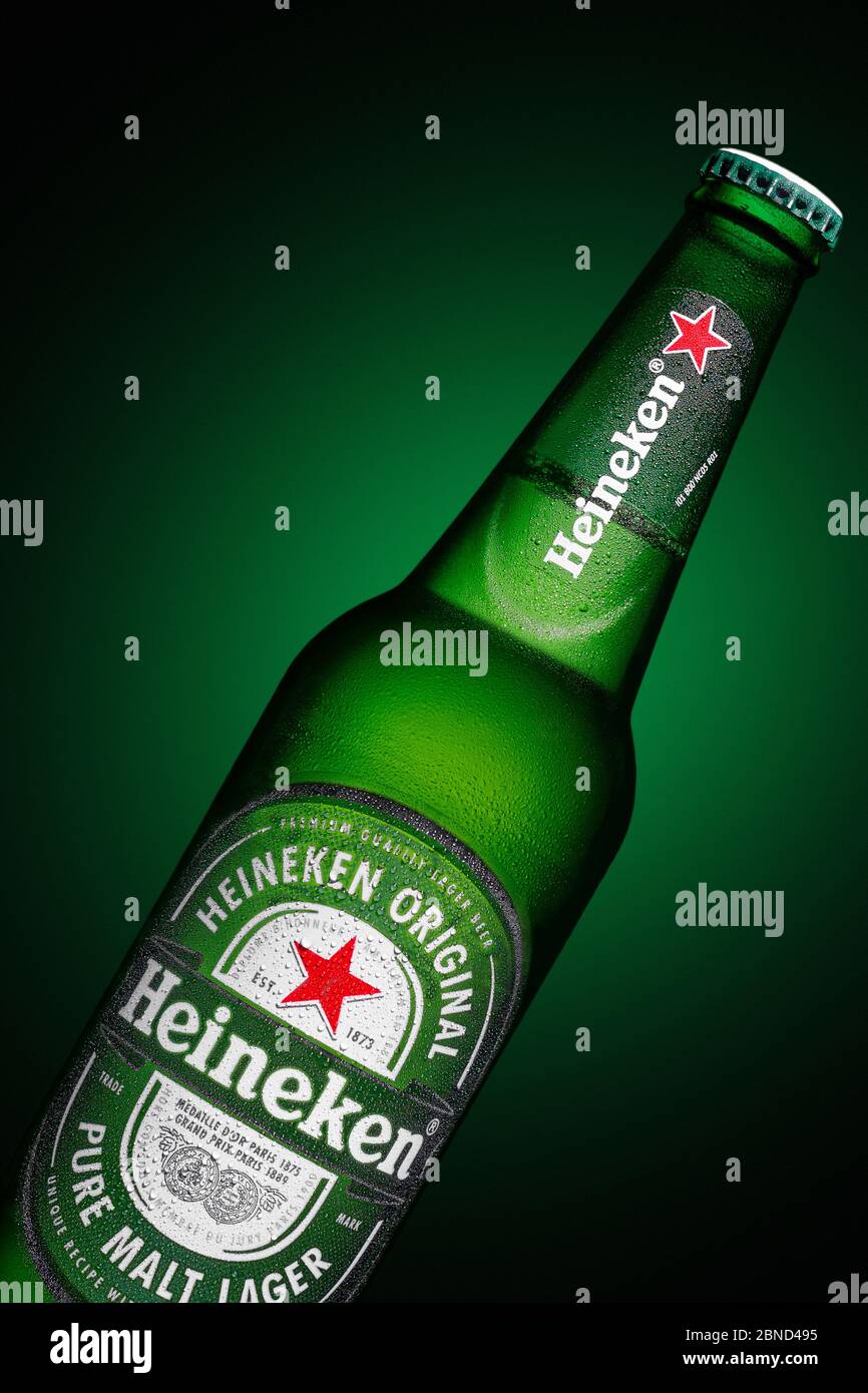 Minsk, Belarus - May 10, 2020 : Bottle of Heineken Lager Beer on green background Stock Photo