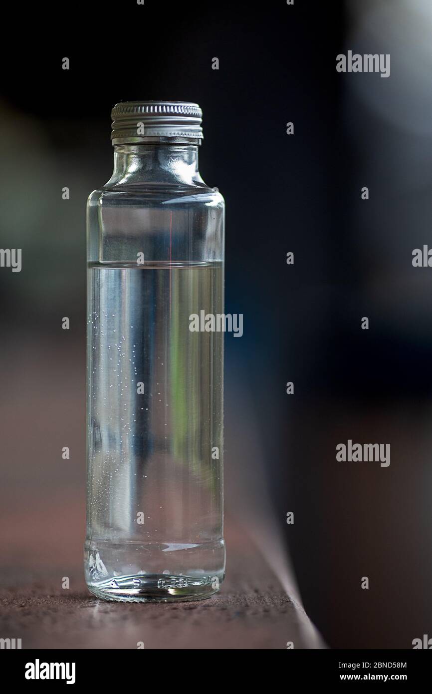 Download Clear Glass Bottle Black Background High Resolution Stock Photography And Images Alamy