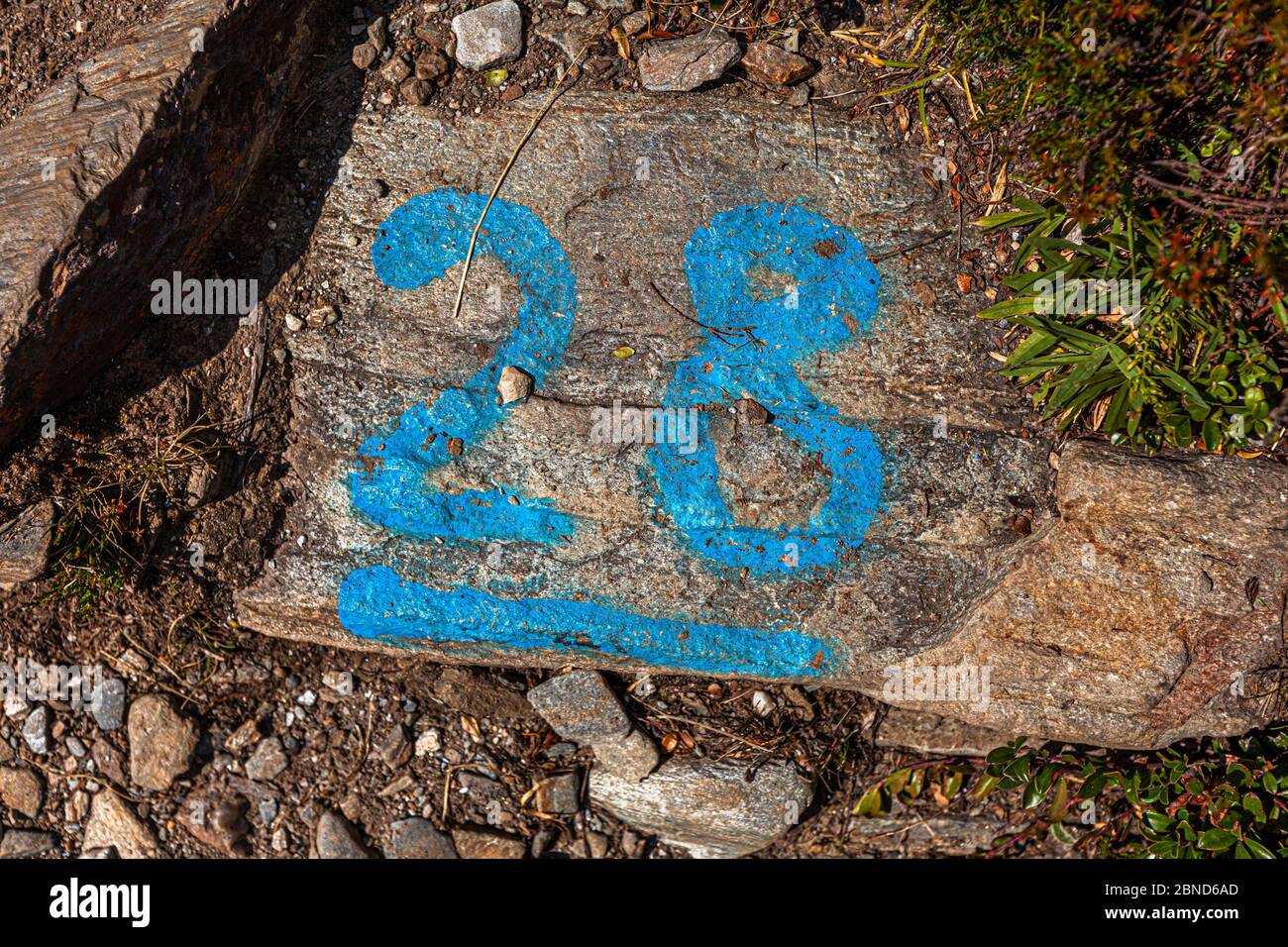 Hiking Trail Mark with number 28 in Alto Adige, Italy Stock Photo