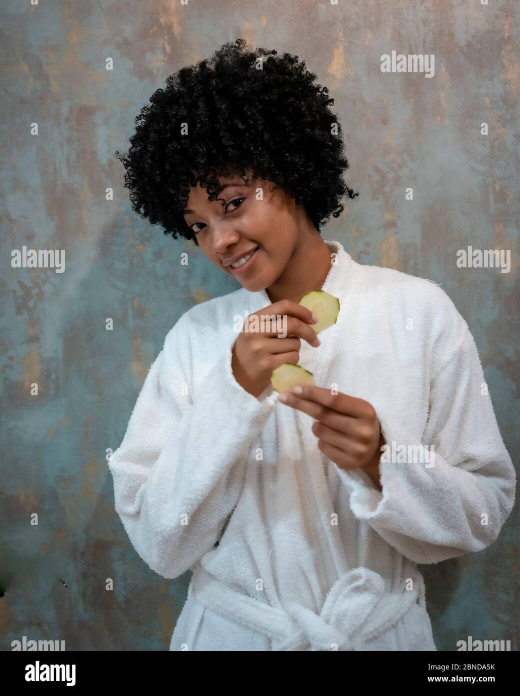 Beautiful Young Colombian Woman With Afro Hairstyle Wearing Fashionable  Casual Clothes Stock Photo - Download Image Now - iStock