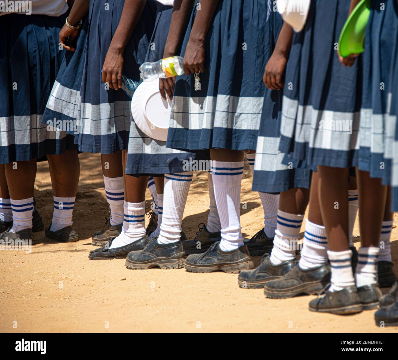 Girls in line for lunch at a secondary school in Kenya Stock Photo