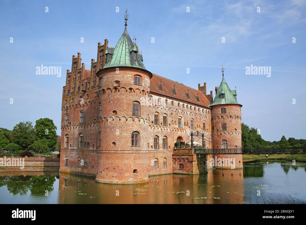 Egeskov Castle is located near Kvaerndrup, in the south of the island of Funen, Denmark. The castle is Europe's best preserved Renaissance water castl Stock Photo