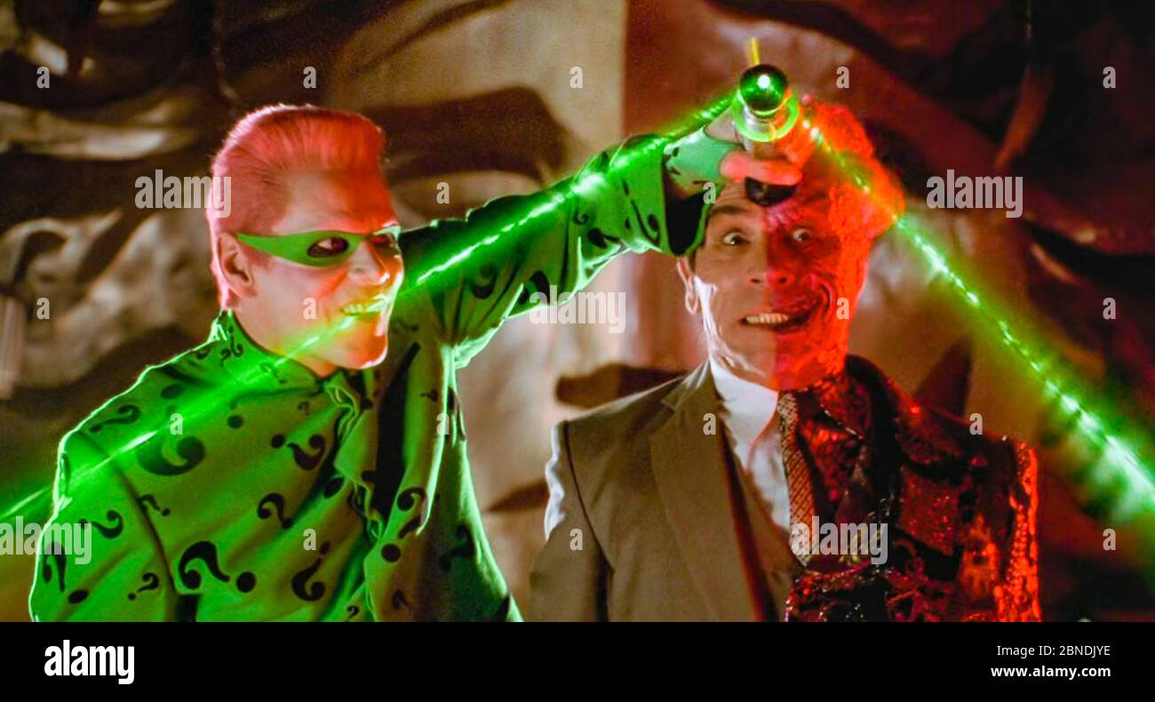 USA. Tommy Lee Jones and Jim Carrey in the ©Warner Bros film Batman Forever (1995) . Plot
