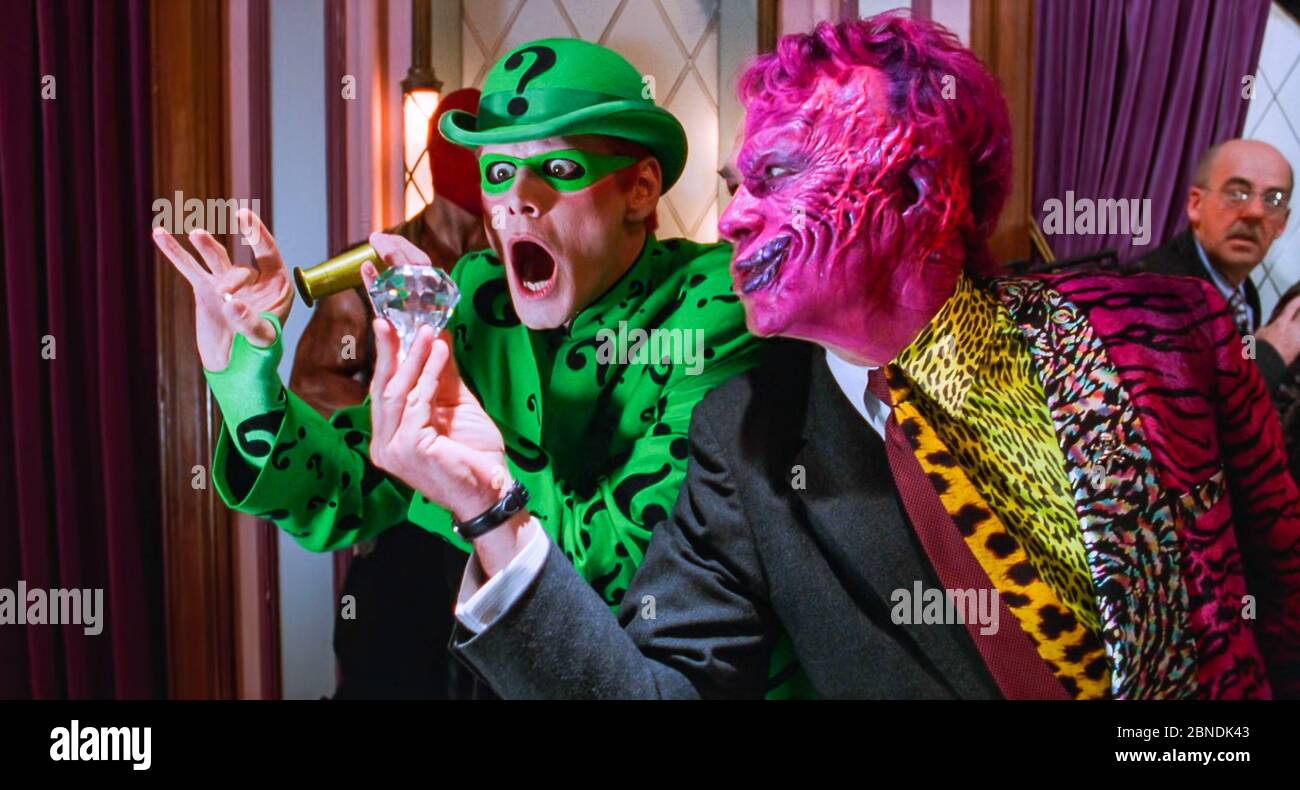 USA. Tommy Lee Jones and Jim Carrey in the ©Warner Bros film : Batman  Forever (1995) . Plot: Batman must battle former district attorney Harvey  Dent, who is now Two-Face and Edward