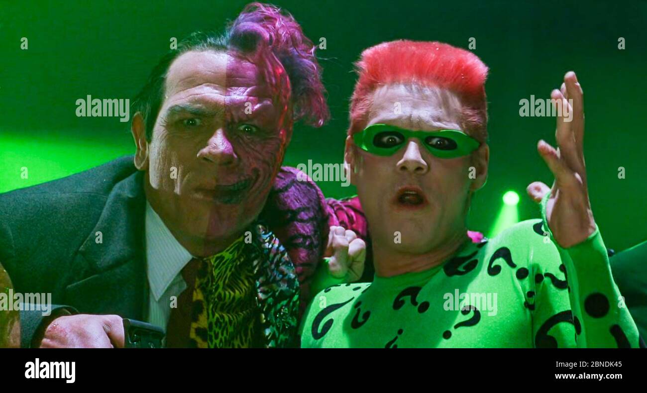 USA. Tommy Lee Jones and Jim Carrey   in the ©Warner Bros film :  Batman Forever (1995) . Plot: Batman must battle former district attorney Harvey Dent, who is now Two-Face and Edward Nygma, The Riddler with help from an amorous psychologist and a young circus acrobat who becomes his sidekick, Robin.  Ref: LMK110-J6506-130520 Supplied by LMKMEDIA. Editorial Only. Landmark Media is not the copyright owner of these Film or TV stills but provides a service only for recognised Media outlets. pictures@lmkmedia.com Stock Photo