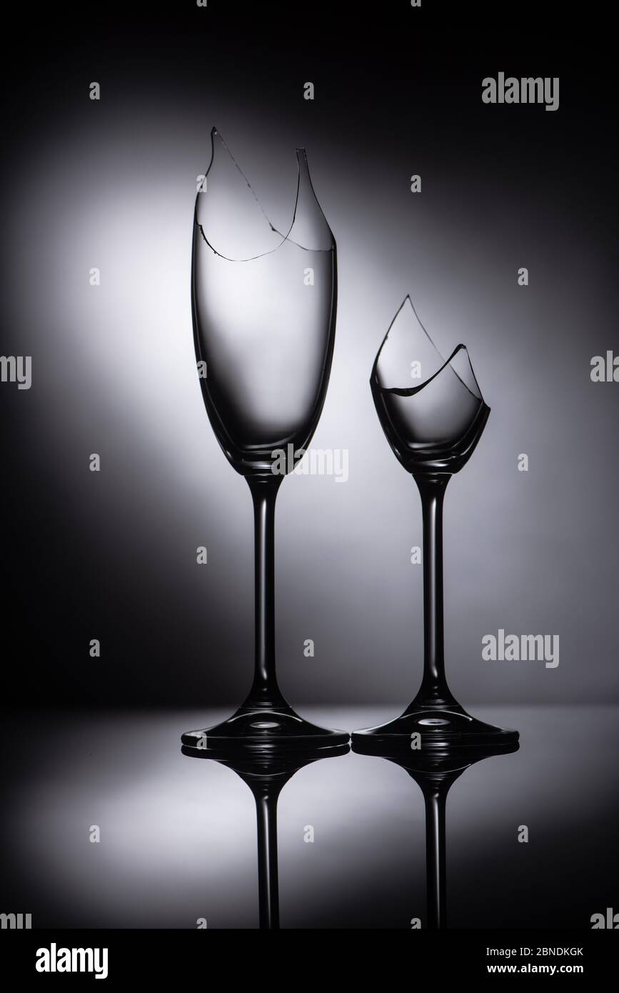 broken sharp transparent glasses in dark Stock Photo - Alamy