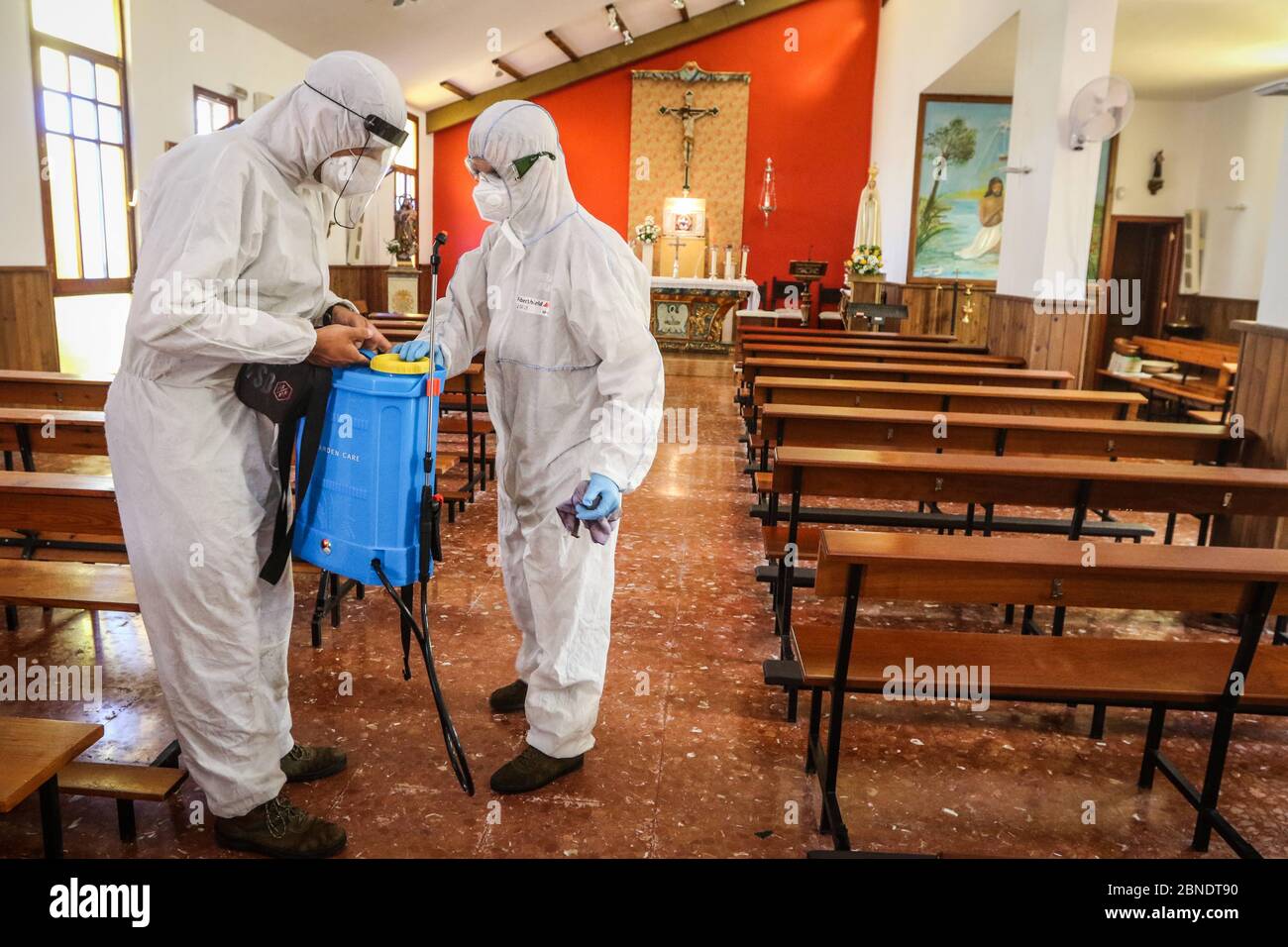 May 14, 2020: 14 May 2020 (Malaga) The disinfection company Fearral carries out cleaning and disinfection work in the Church of Santa MarÃ-a Inmaculada in Torre de BenagalbÃ³n del RincÃ³n de la Victoria altruistically due to the coronavirus crisis Credit: Lorenzo Carnero/ZUMA Wire/Alamy Live News Stock Photo