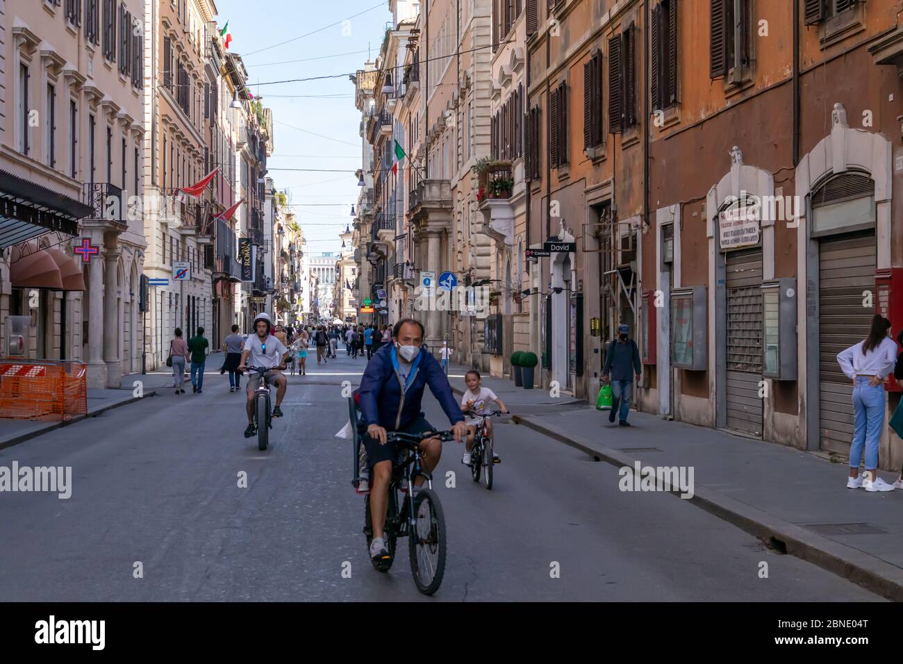 Rome, Italy - May 10, 2020: Via del Corso, first exit of citizens after the end of the restrictions for the Covid-19 pandemic. People stroll on the st Stock Photo