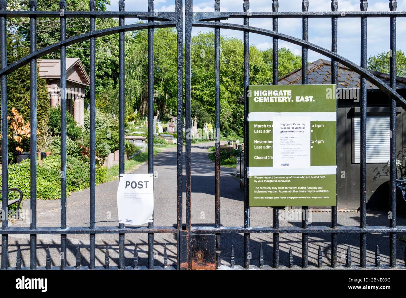 The locked gates of Highgate Cemetery on Swains Lane, closed during the coronavirus pandemic lockdown, London, UK Stock Photo