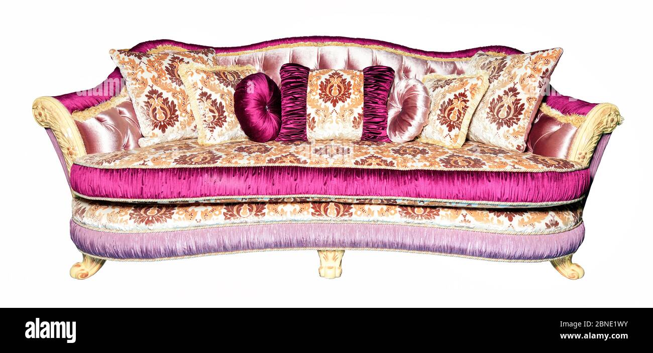 Luxurious sofa upholstered in expensive brocade textile fabric isolated on a white background. Stock Photo