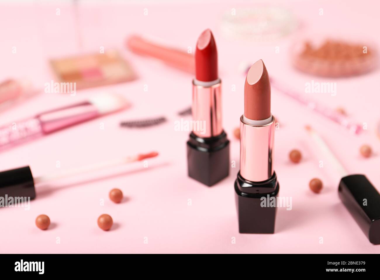 Set of lipsticks on the background of decorative cosmetics Stock Photo