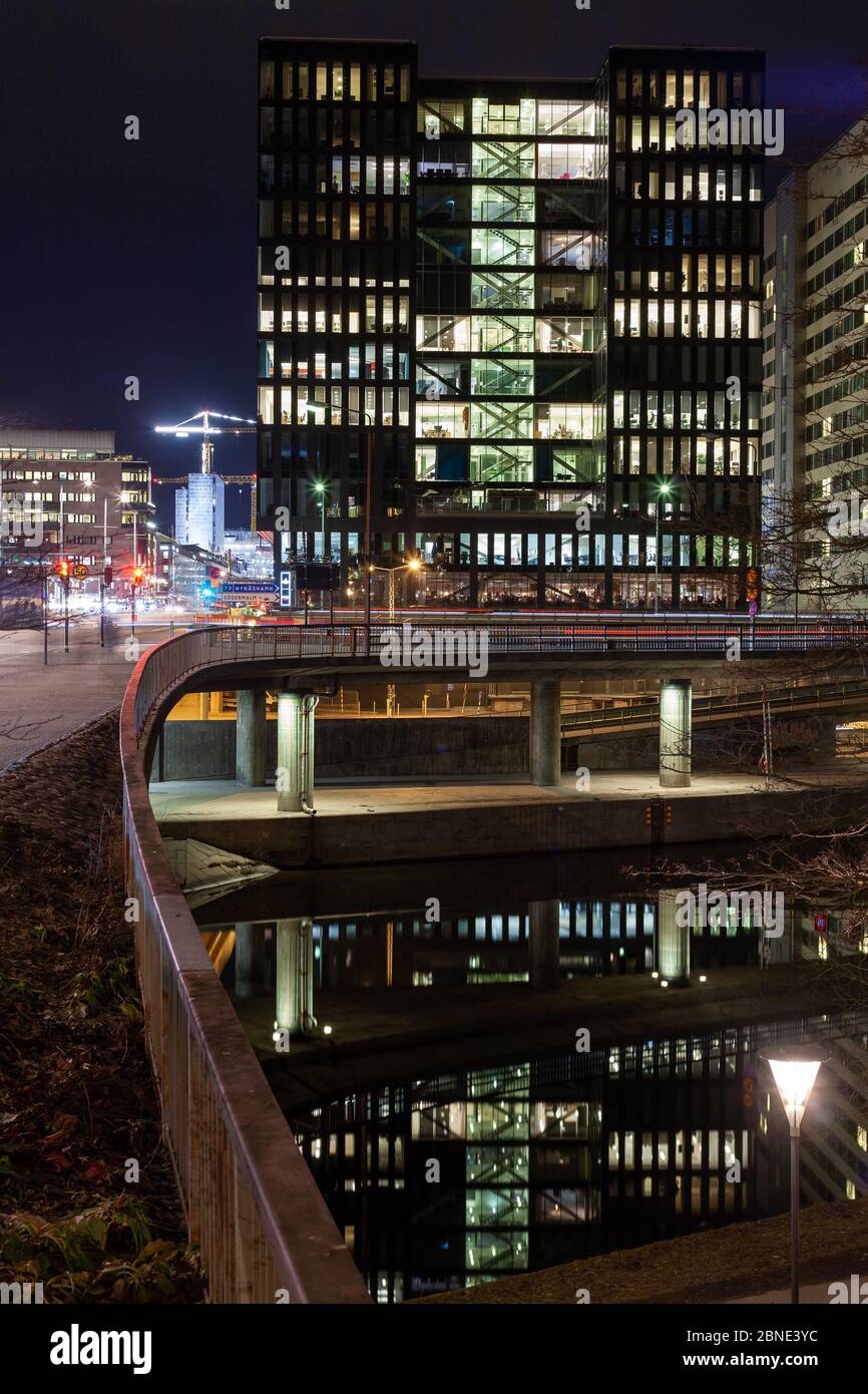 Beautiful vertical shot of a city with evening lights Stock Photo - Alamy
