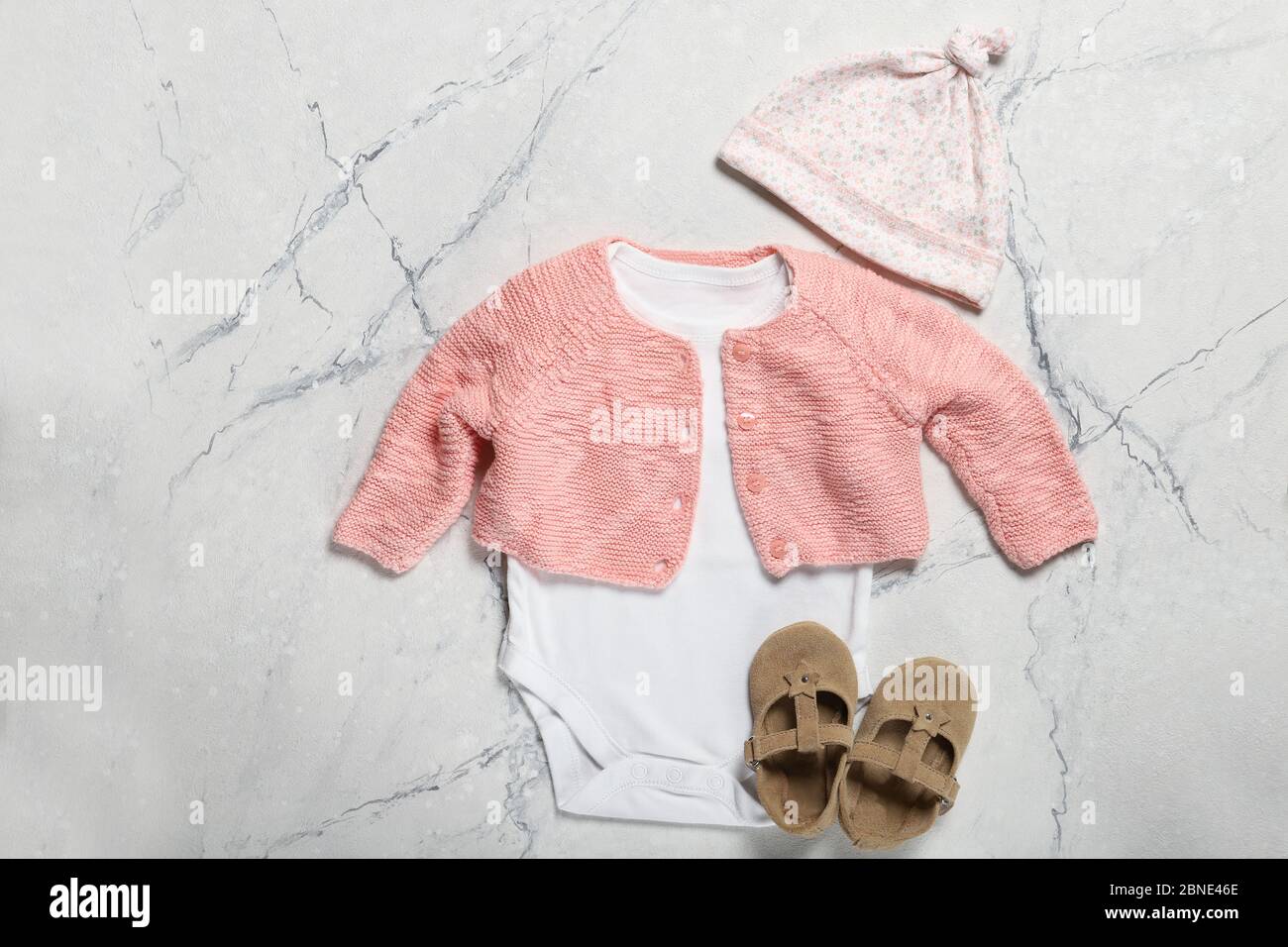 Beautiful baby clothes and accessories Stock Photo Alamy