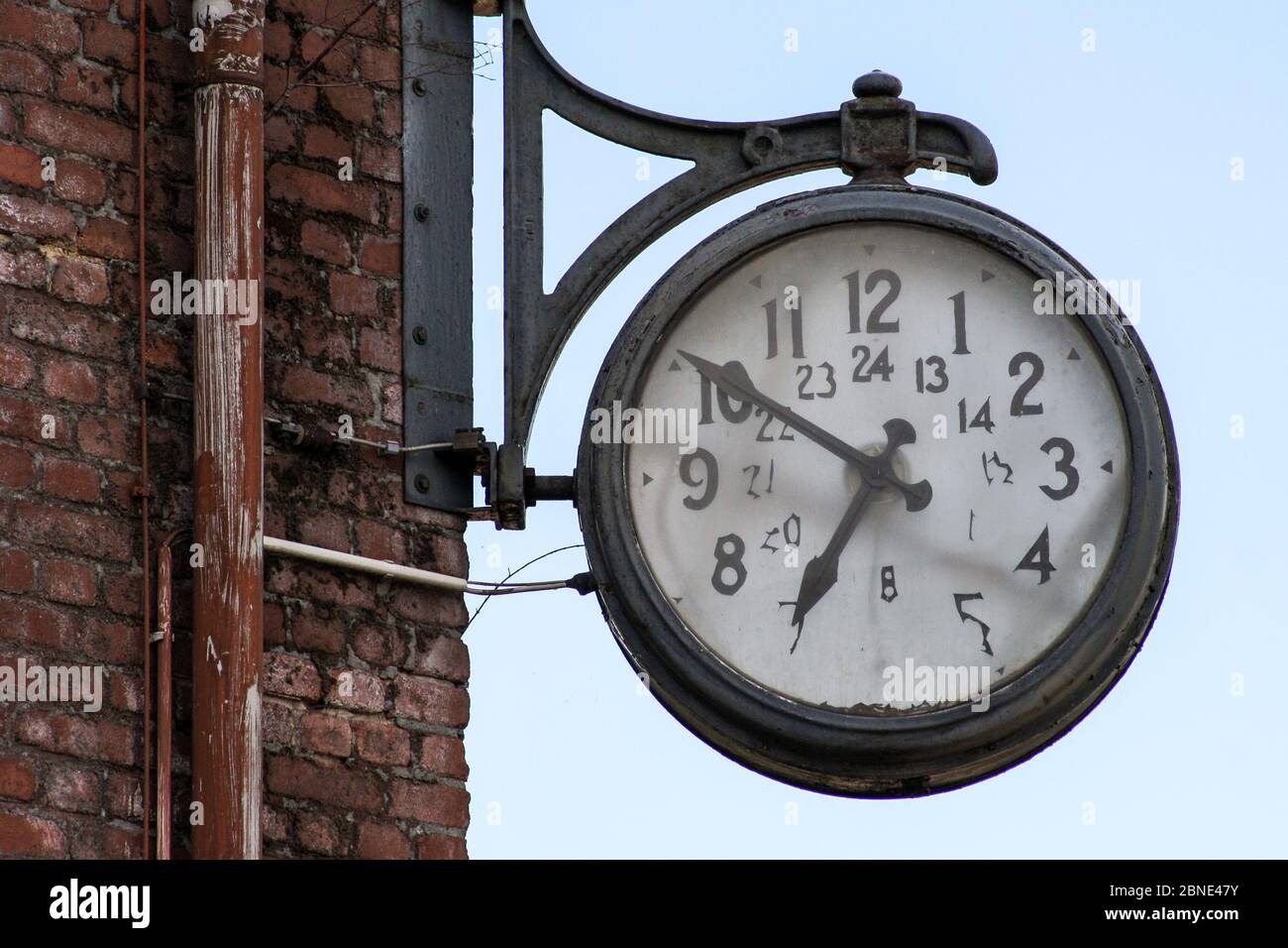 Old clock on a brick wall Stock Photo Alamy