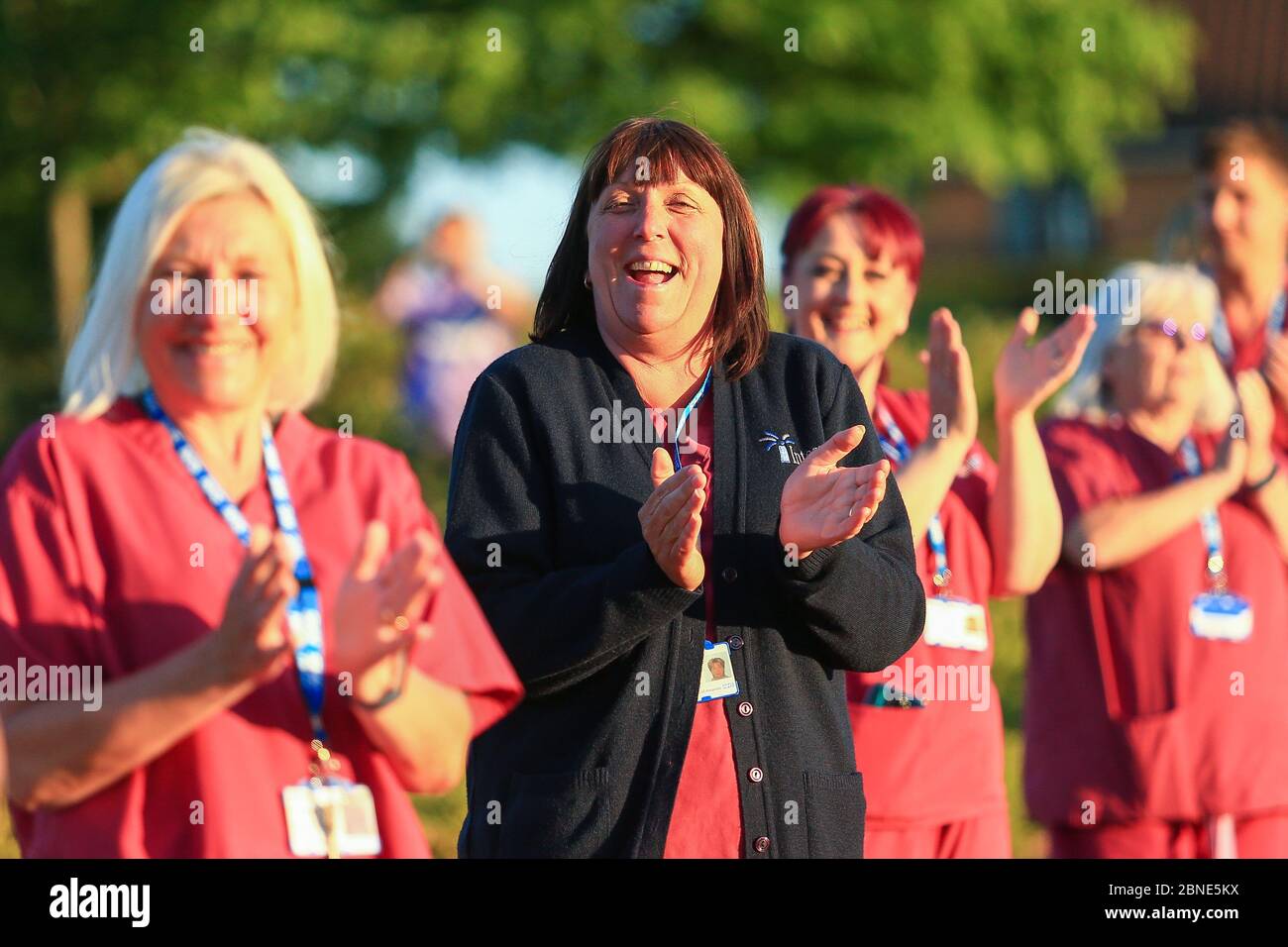 Dudley, West Midlands, UK. 14th May, 2020. Nurses and hospital staff at Russells Hall hospital in Dudley, West Midlands, come outside to applaud carers and fellow NHS frontline workers. Credit: Peter Lopeman/Alamy Live News Stock Photo