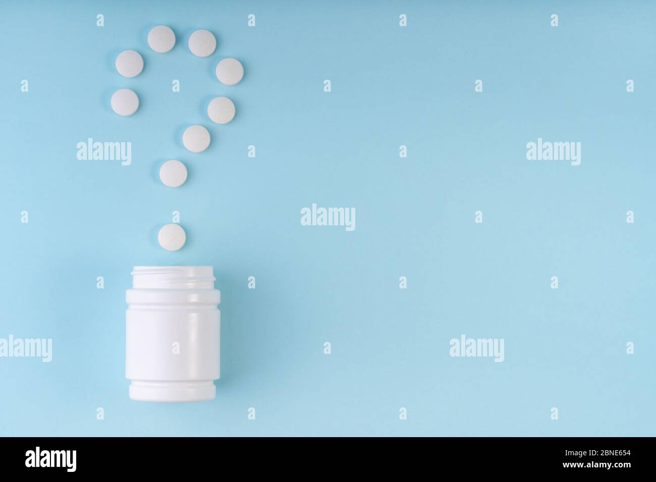 Question sign, mark from pharmaceutical medicine pills. Creative layout ...