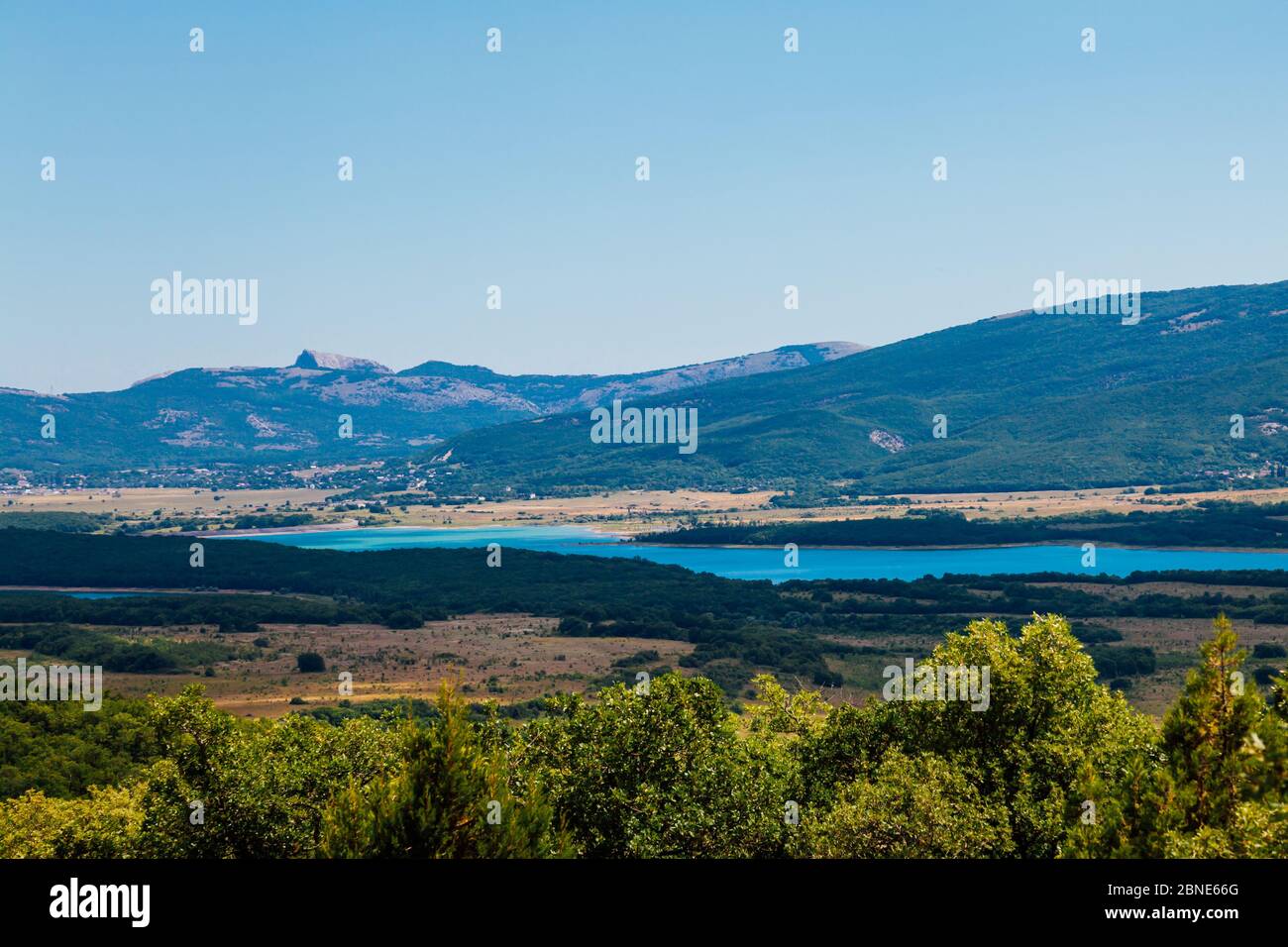 beautiful landscape green forest mountains blue sky Stock Photo - Alamy