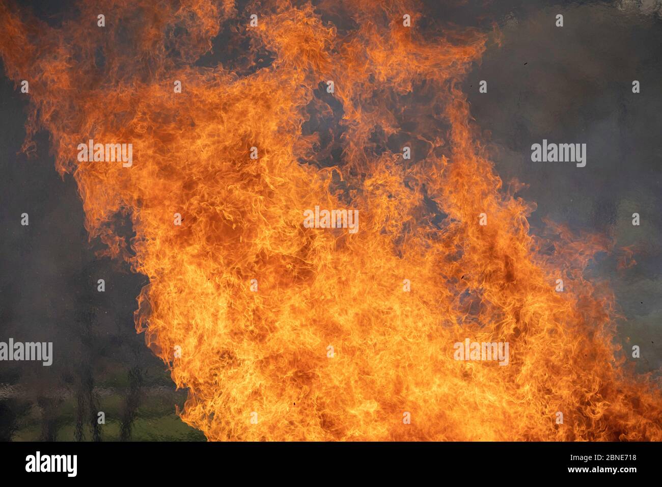 demolished wooden hut set on fire after demolition Stock Photo