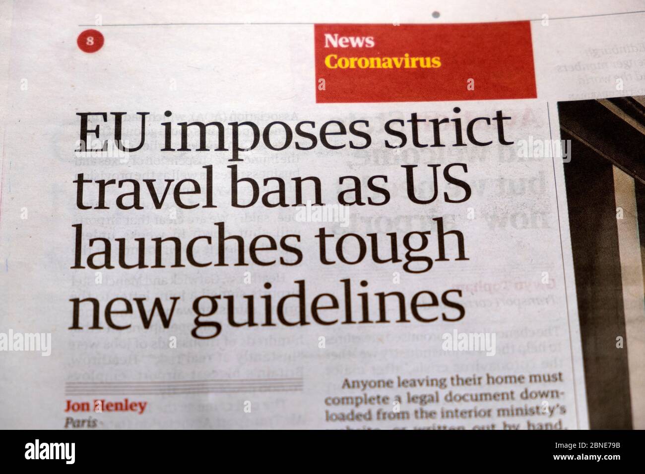 'EU imposes strict travel ban as US launches tough new guidelines' Guardian newspaper headline article in March 2020 London UK Stock Photo
