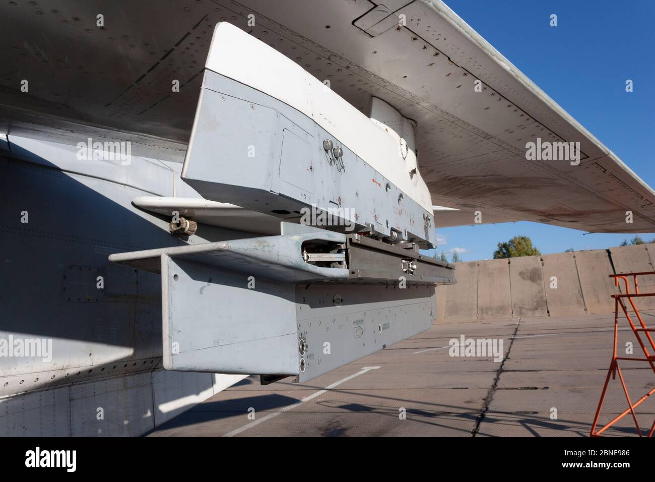 Pylon under the wing of a military aircraft for hanging missiles and bombs. Stock Photo