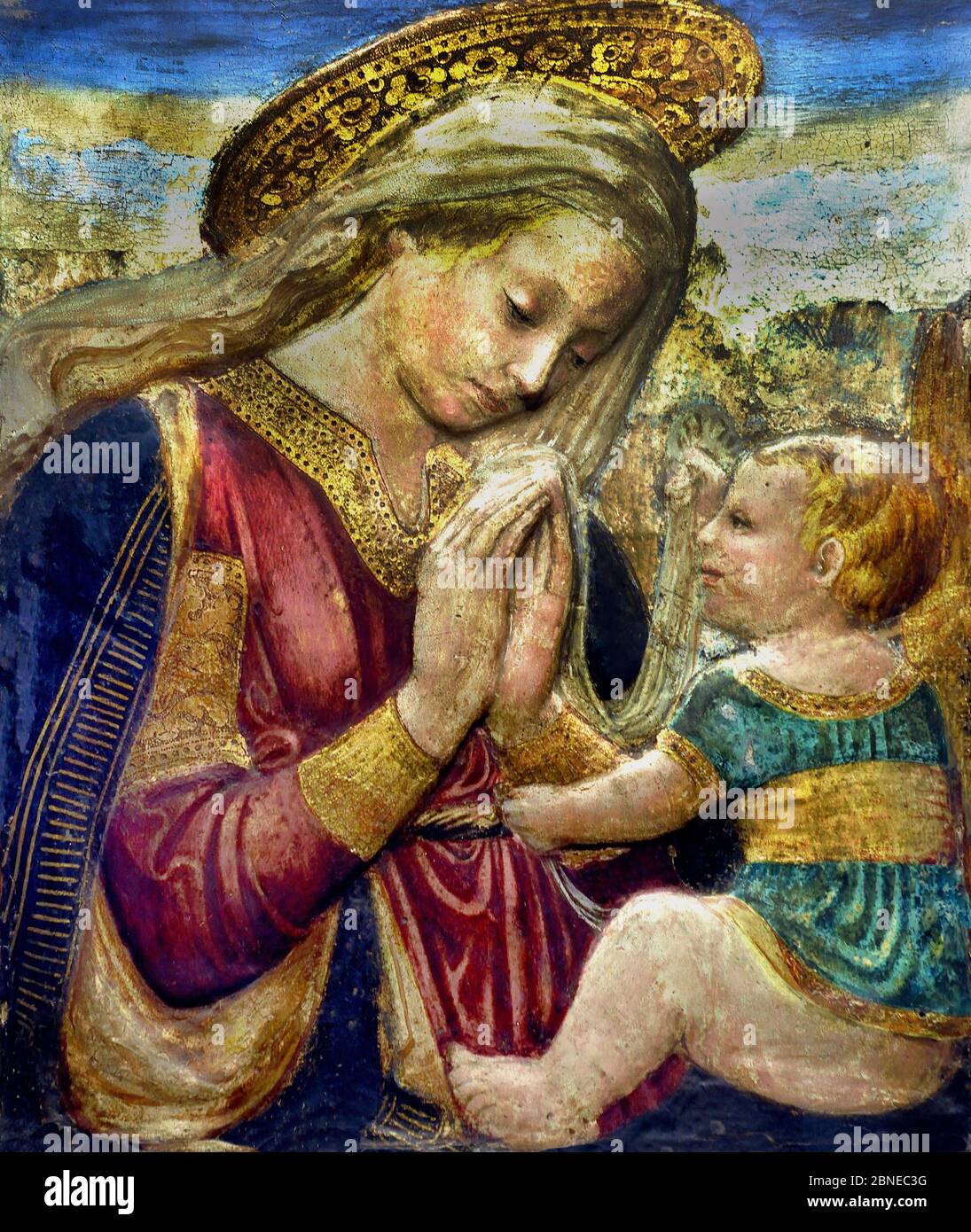 The Virgin Mary worshiping Child Jesus Christ Stucco Paint by Desiderio da Settignano 1430 - 1464  1427 - Florence Italy Italian Stock Photo