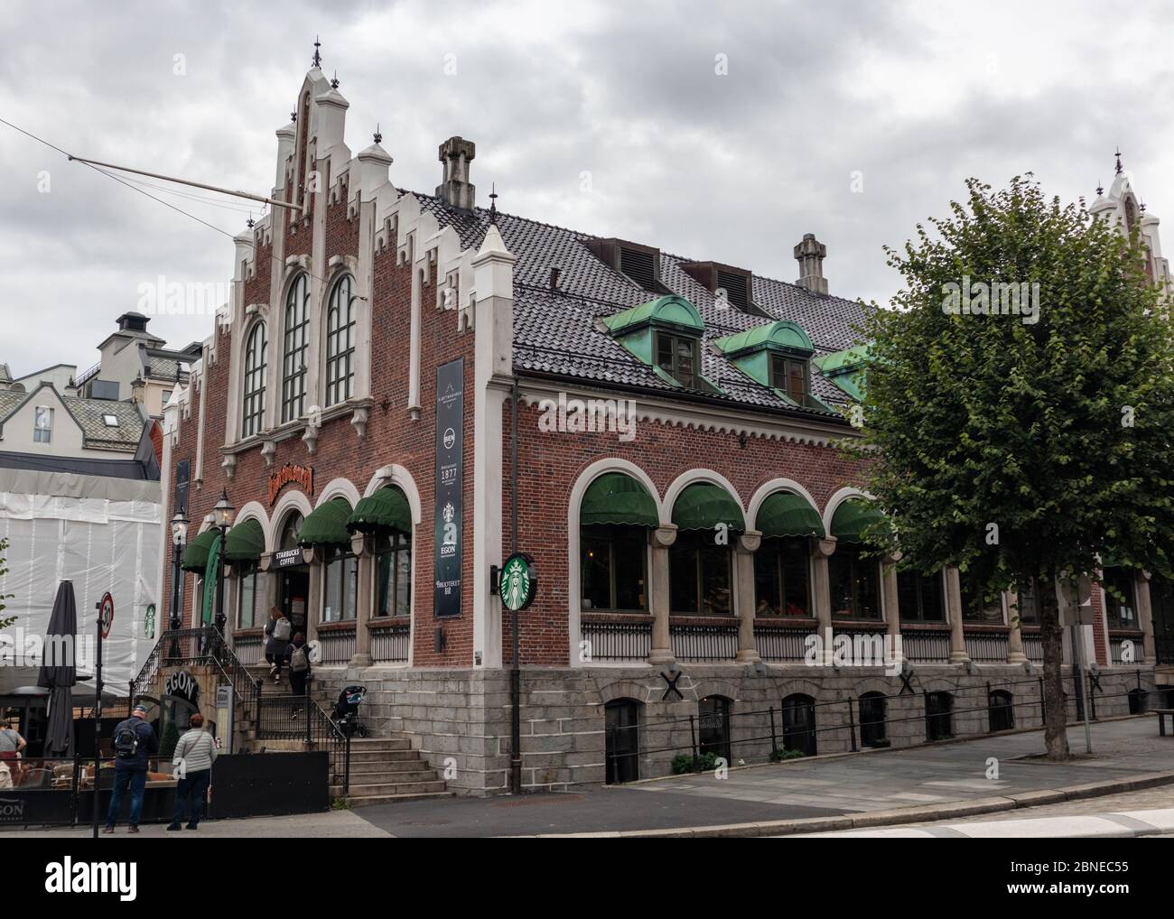 Bergen, Norway - September 09, 2019: Starbucks restaurant coffeehouse in gothic red bricks traditional nordic house in old city Stock Photo