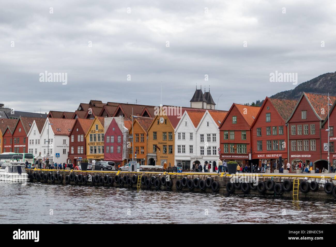Sea water view on historical buildings in Hanseviertel Bryggen wharf in Bergen, Norway. UNESCO World Heritage Site Stock Photo