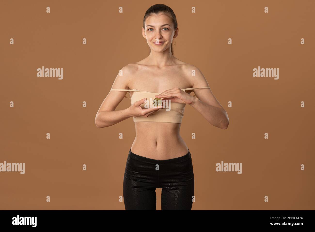 Hand bra hi-res stock photography and images - Alamy