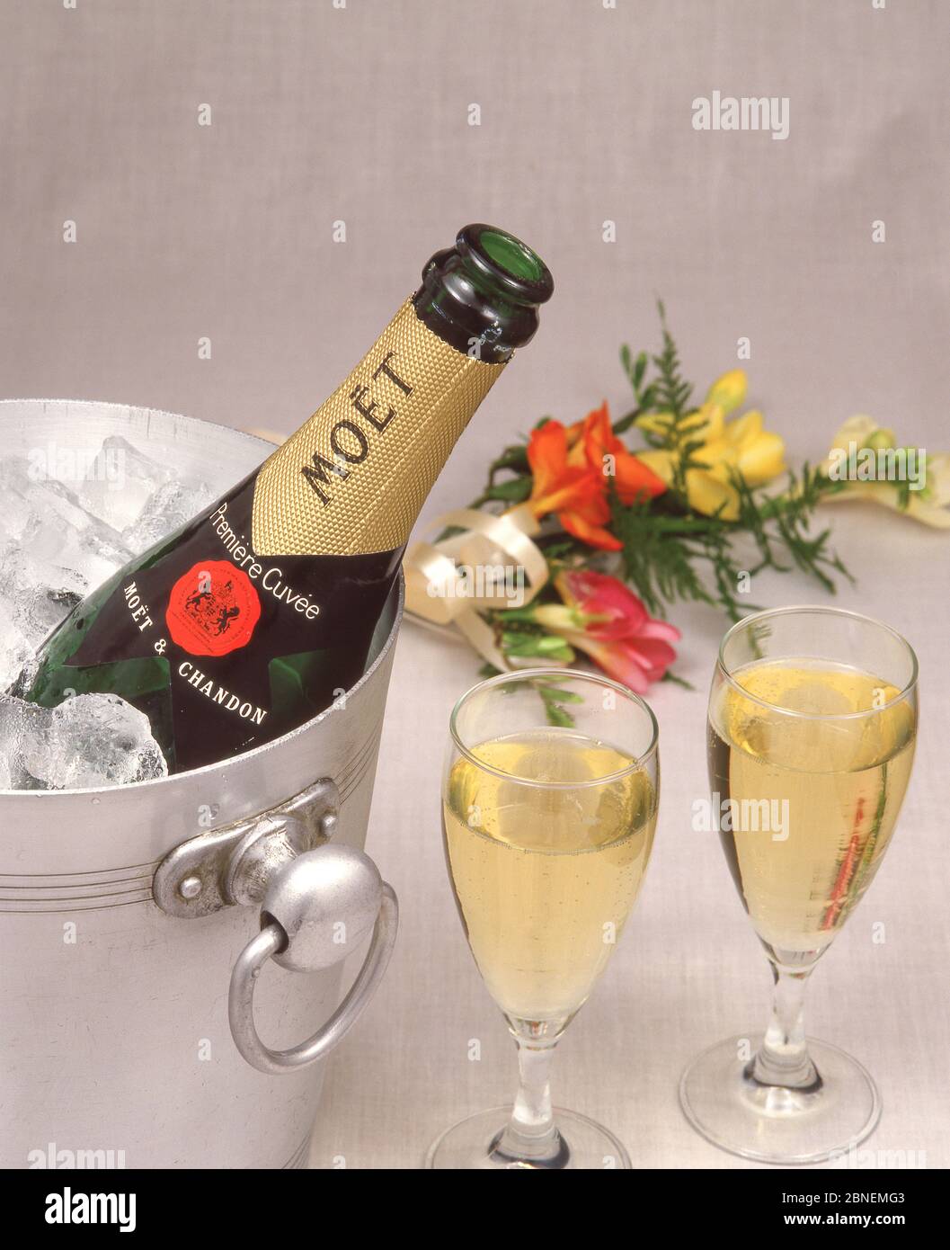 Moët & Chandon champagne in ice-bucket with napkin and crystal glasses, Greater London, England, United Kingdom Stock Photo
