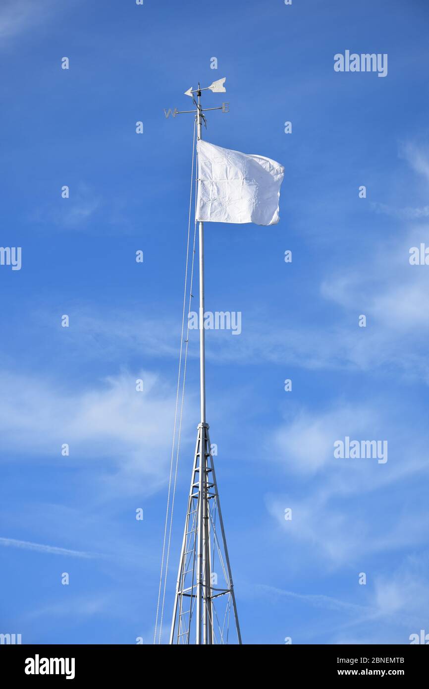 A Fair Weather Flag along the Washington, NC Waterfront. Stock Photo