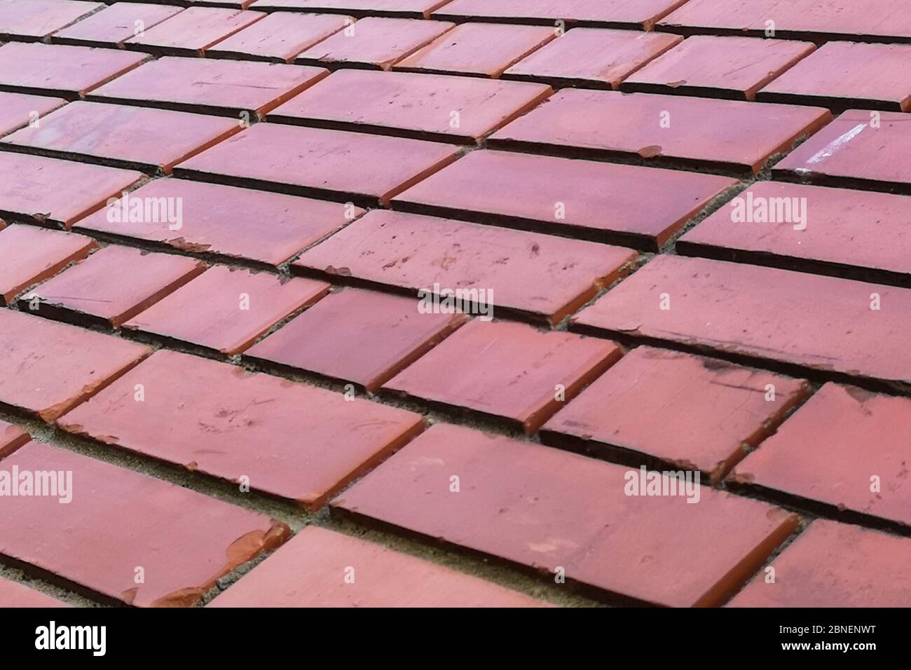 Red brick wall perspective view. block pattern texture background. Stock Photo