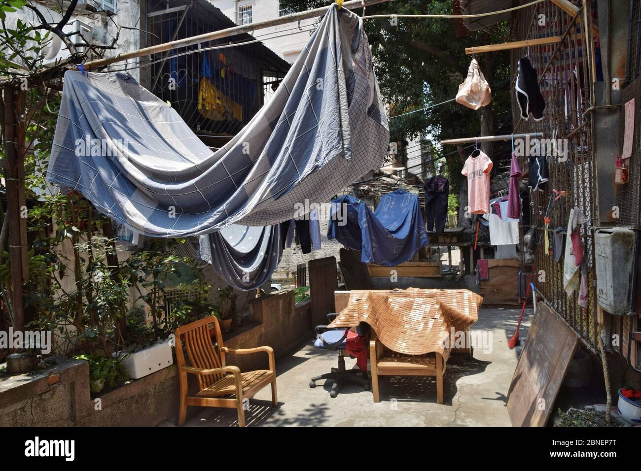 Hanging clothes under the sun, outside sun drying in the small