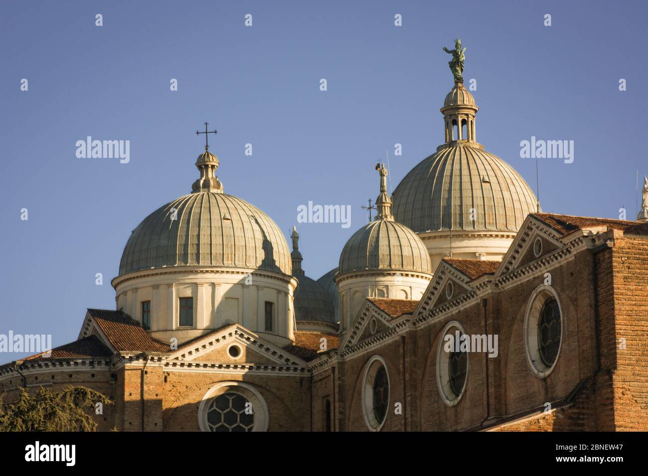 Domes of an old catholic church in Italy Stock Photo