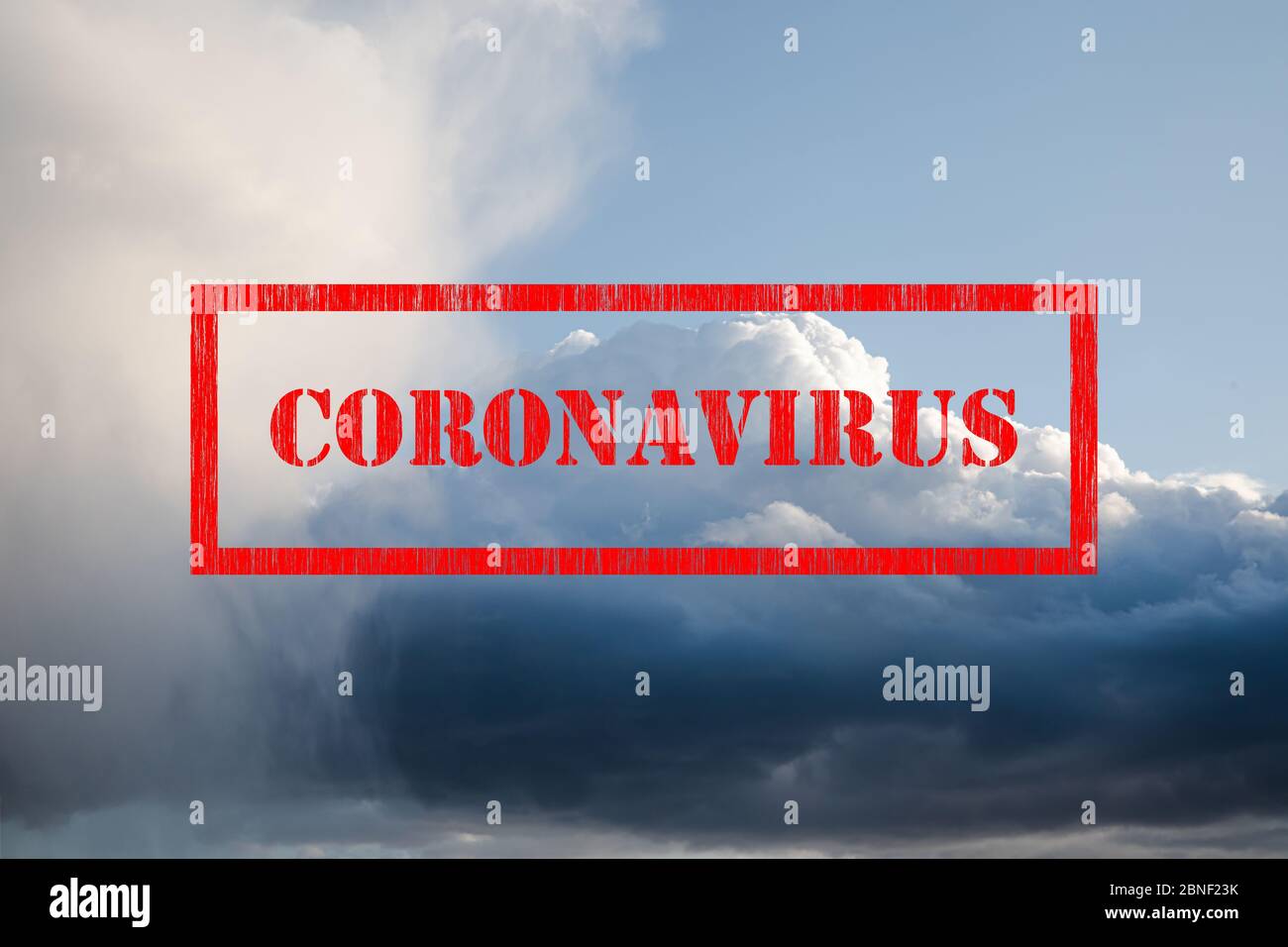 Coronavirus red sign stamp on bright big blue cumulus clouds with silver lining sky background Stock Photo
