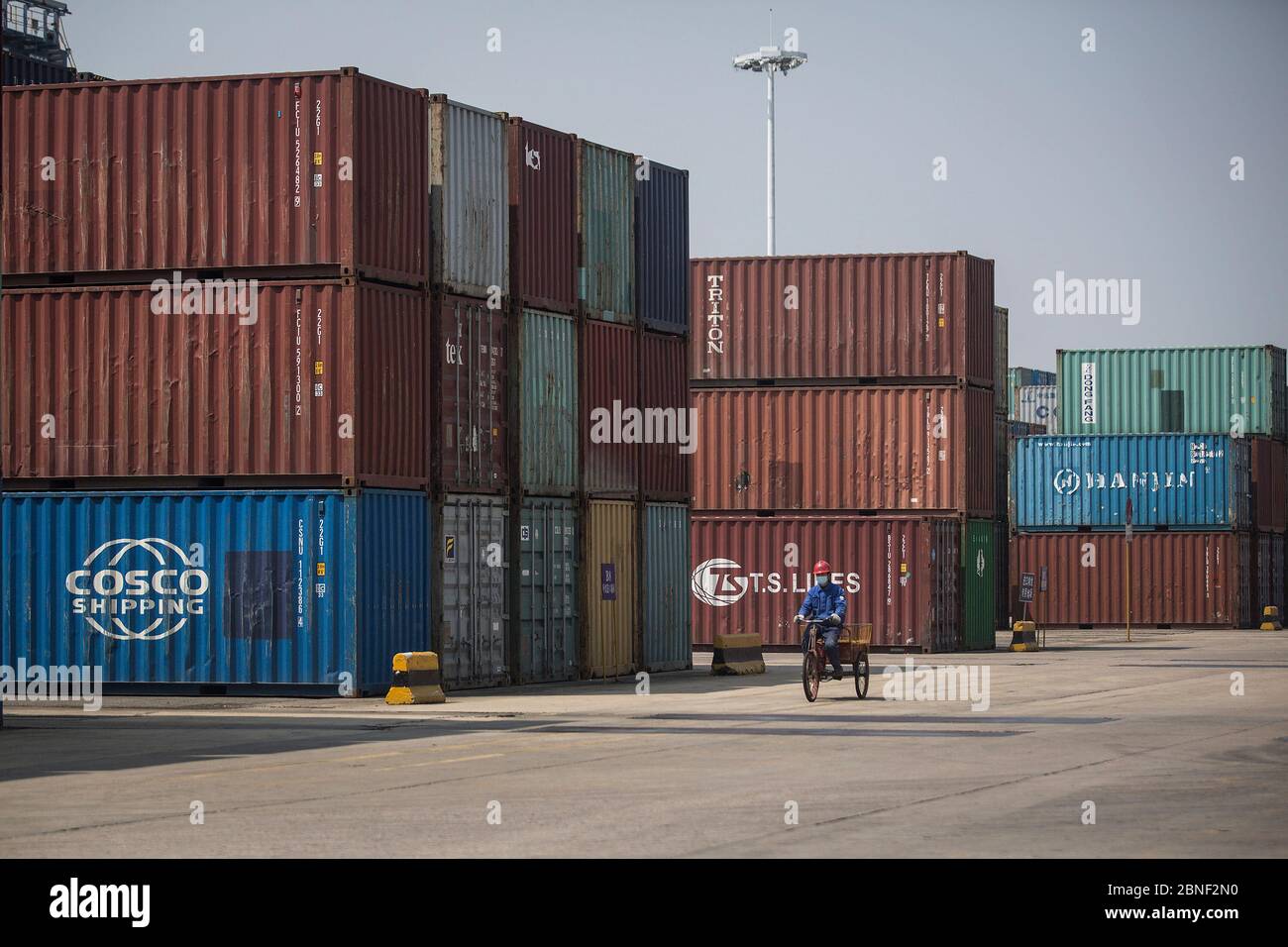 Containers are arrayed waiting to be delivered by cargo vessels at a port, Wuhan city, central China's Hubei province, 30 April 2020. *** Local Captio Stock Photo